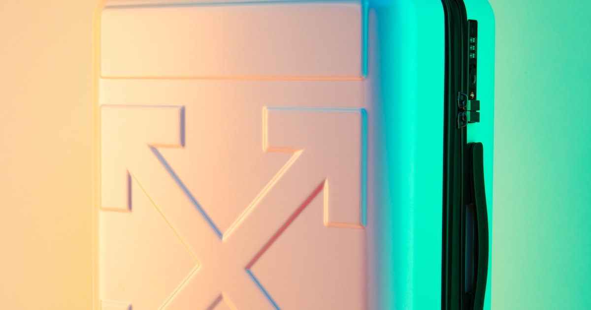 Neatly packed carry-on suitcase with packing cubes and travel essentials organized efficiently