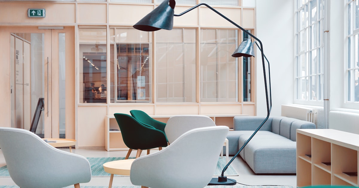 Ergonomic home office setup with proper chair, desk height, and monitor positioning