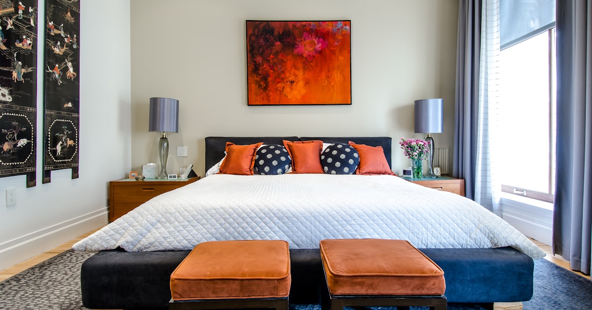 Peaceful bedroom setup with sleep-enhancing products and dim lighting