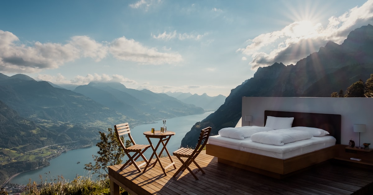 Professional business travel packing setup with suits and essentials